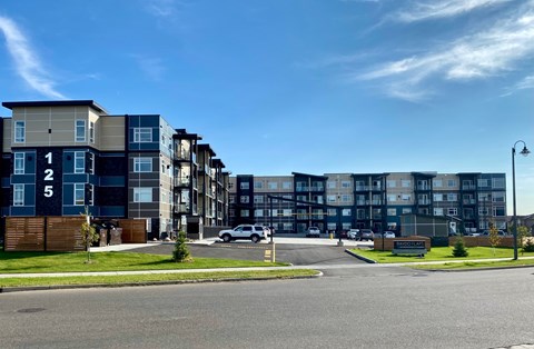 a large building with a street in front of it