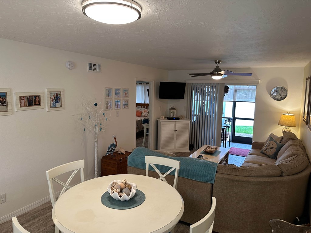 a view of the living room and dining room from the kitchen