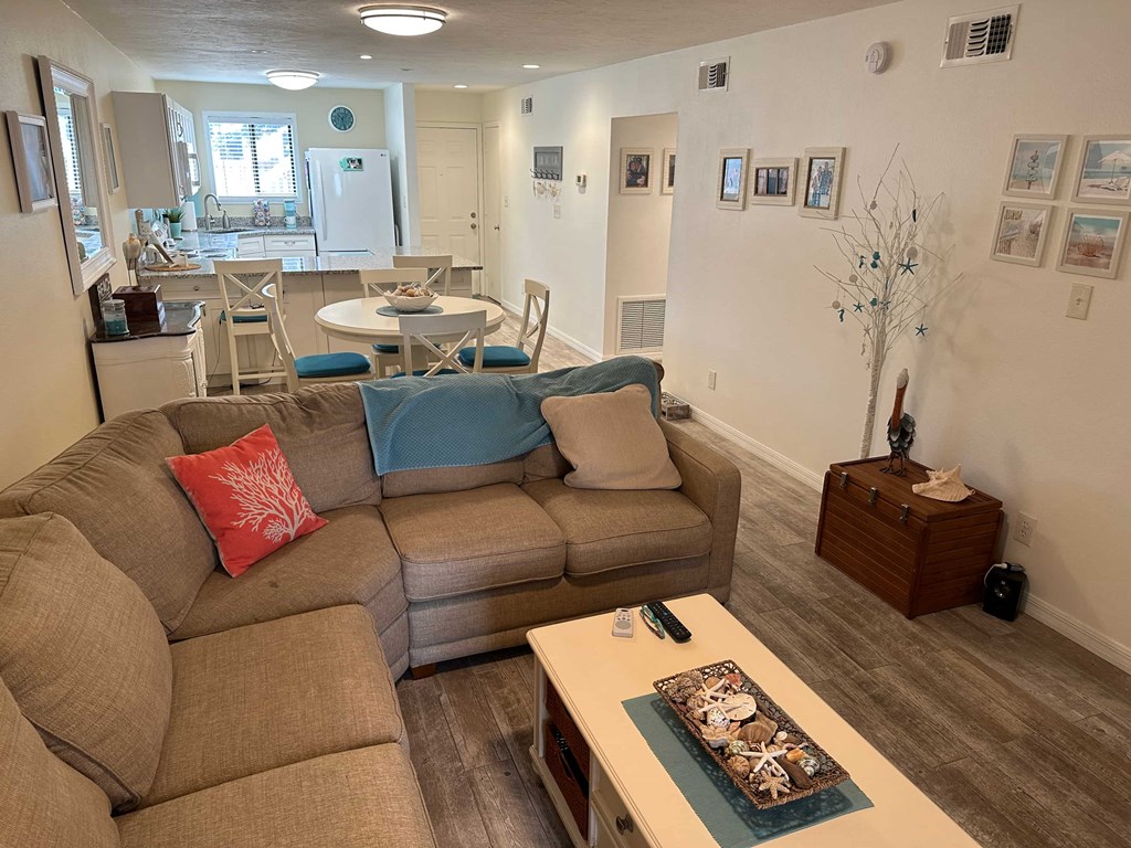 a living room with a couch and a table