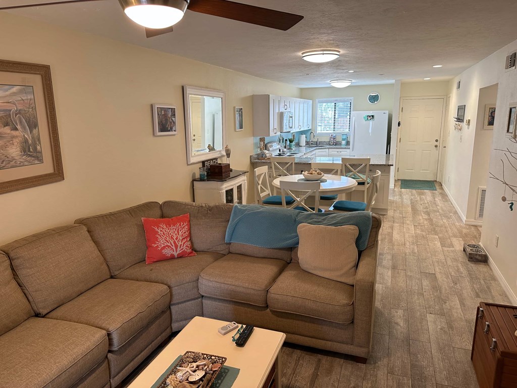 a living room with a couch and a table