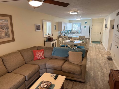 a living room with a couch and a table