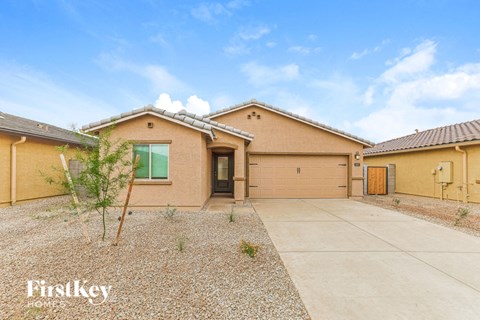 a house with a driveway and a garage door