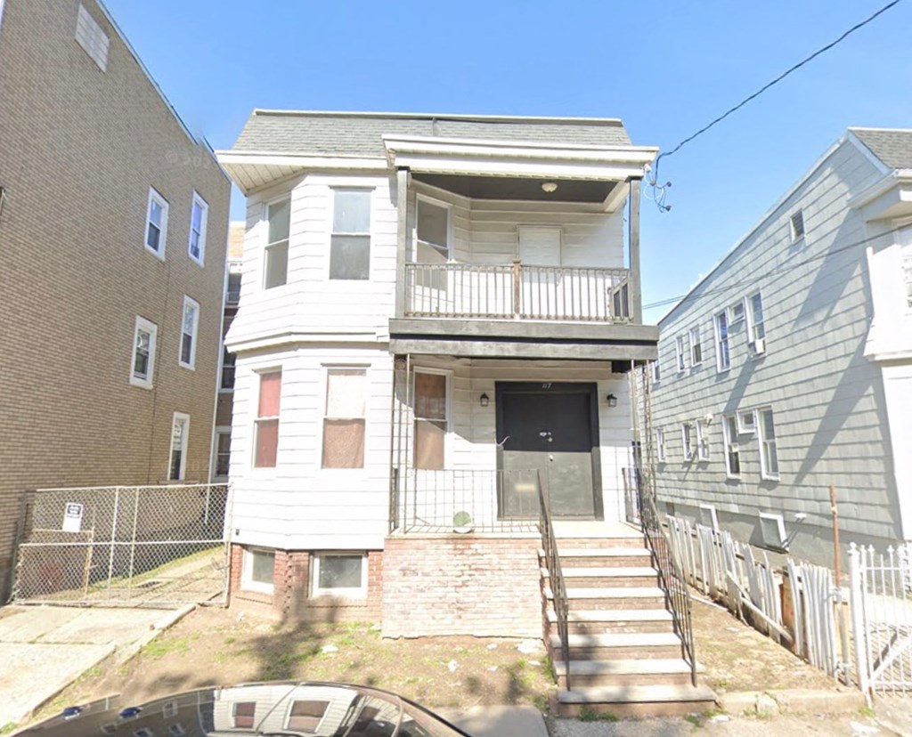 an old with stairs in front of it