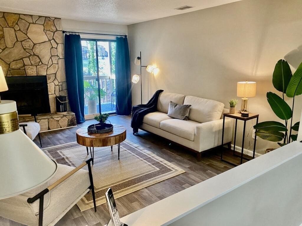 a living room with a couch and a table