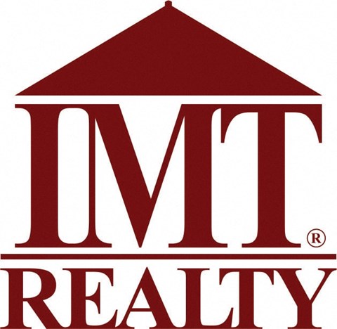 A logo for a realty company with a red house shape above the text.
