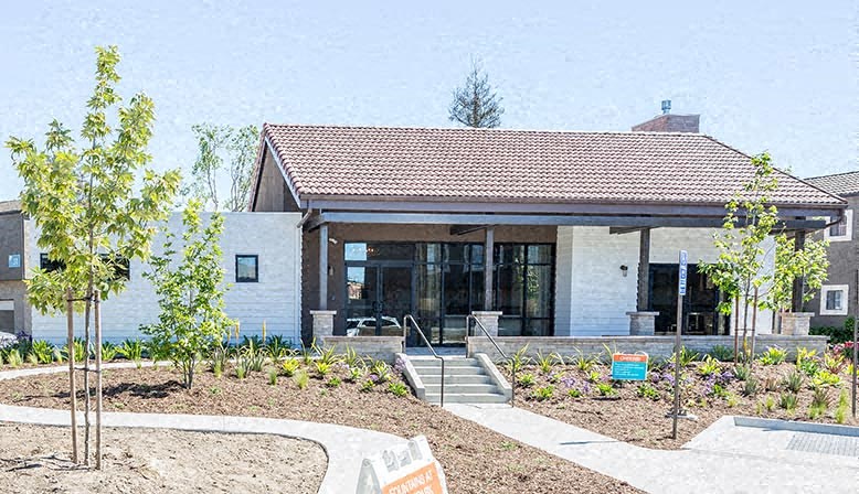 a house with a garden in front of it