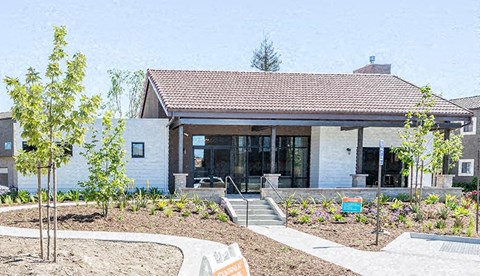 a house with a garden in front of it