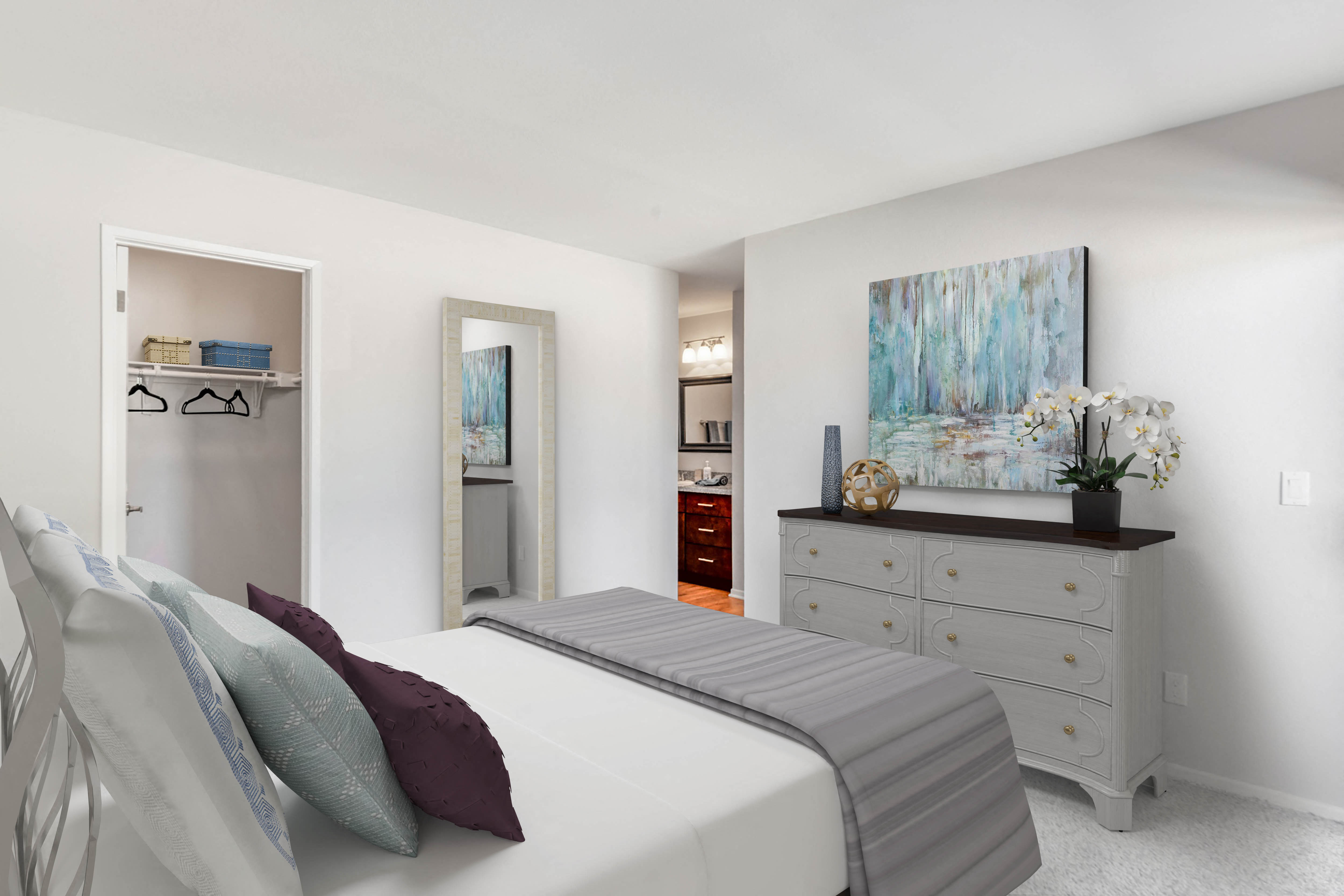 a bedroom with a bed and a dresser