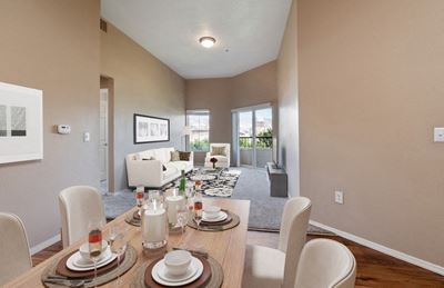 Model dining & living room with patio entrance