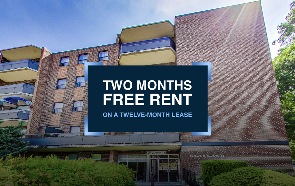 A building with a sign offering two months free rent on a twelve-month lease.