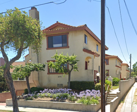 a house with a garden in front of it