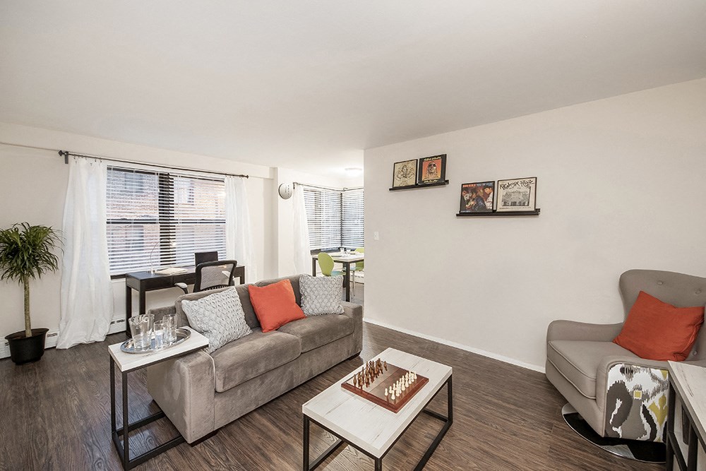 a living room with a couch and a table