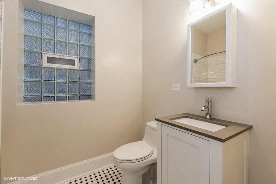 a small bathroom with a toilet and a sink