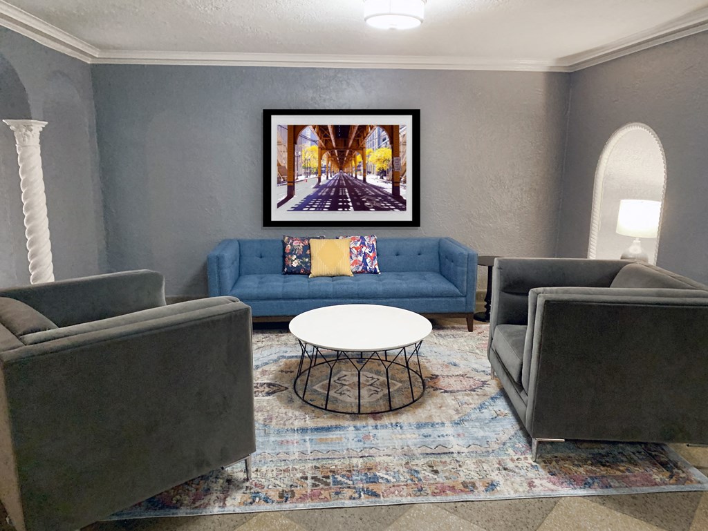 a living room with couches and a table