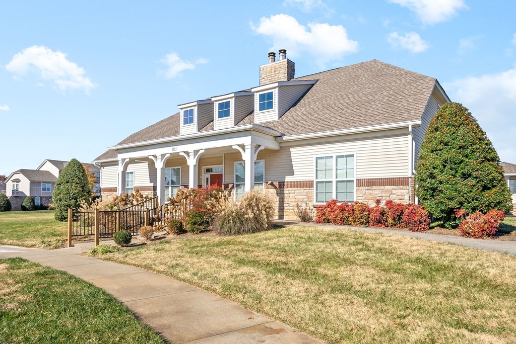 a house with a sidewalk in front of it