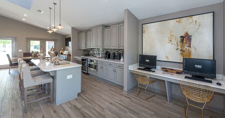 clubroom kitchenette area with gray cabinets and appliances