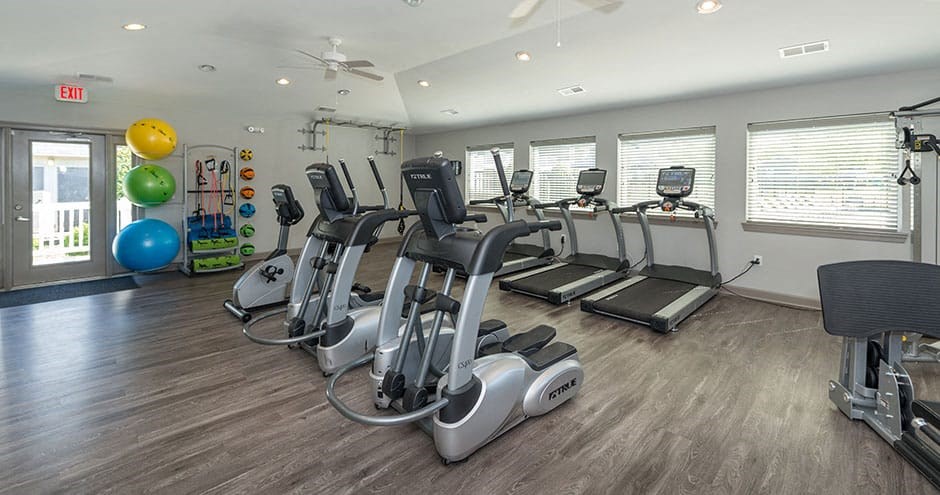 fitness center with cardio equipment
