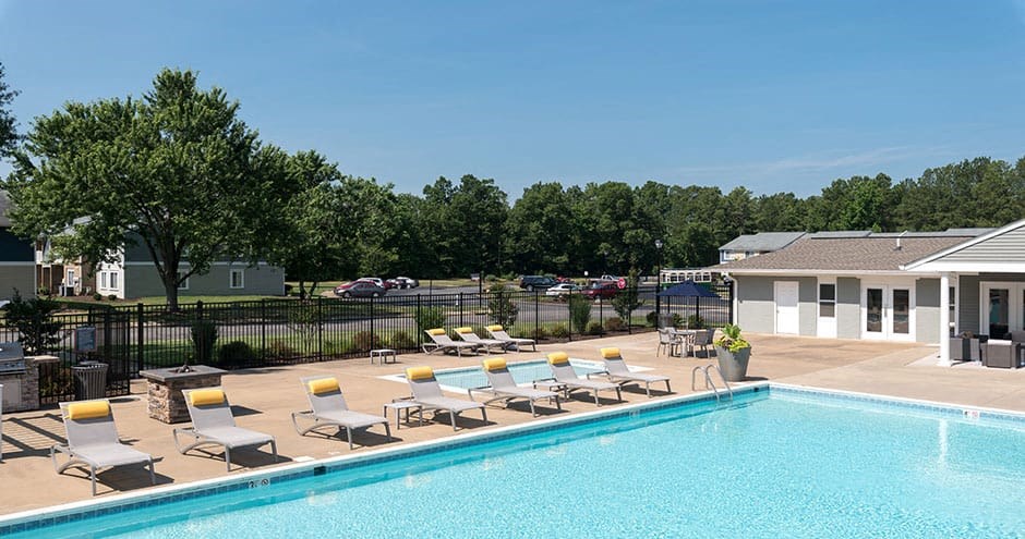 outdoor swimming pool with lounge chairs