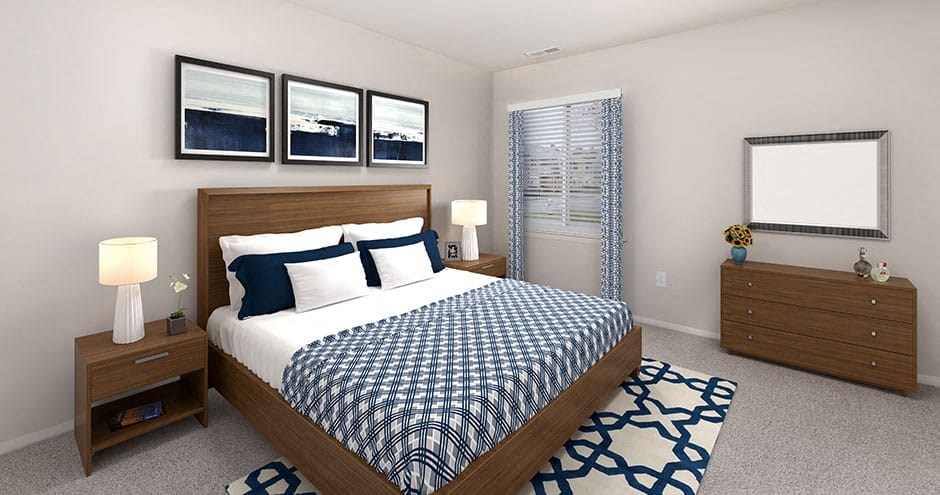 bedroom of the apartment showing queen bed with a window and artwork