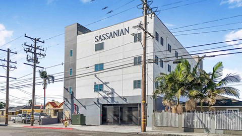 A white building with the word "SASSANIAN" on the side.