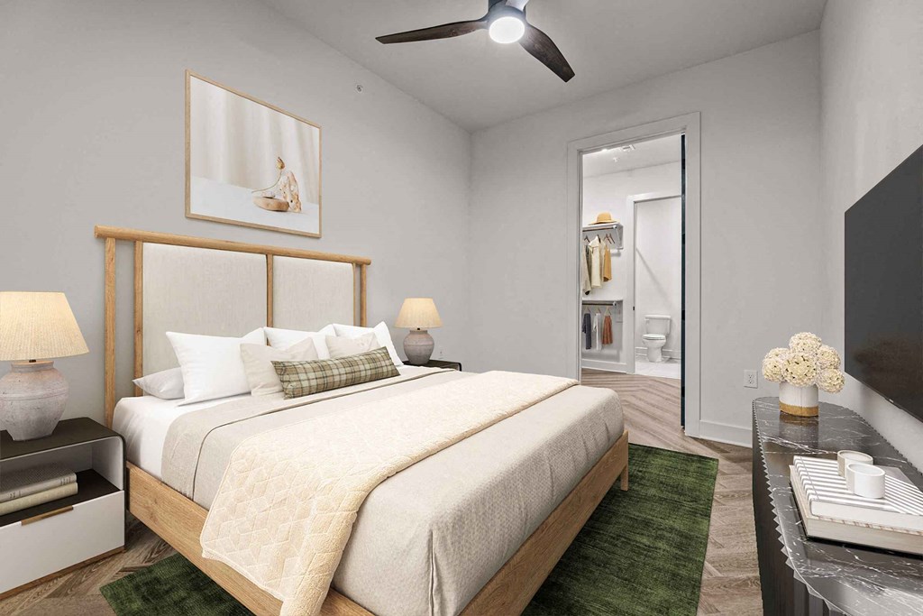 a bedroom with a large bed and a closet