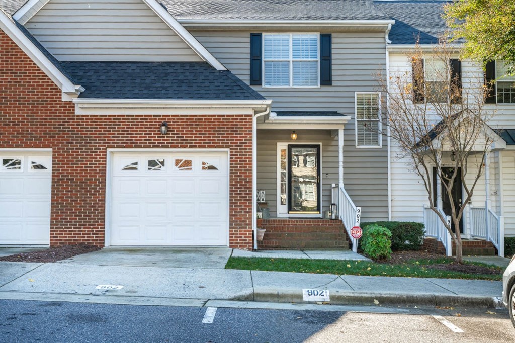a house with a white garage door in front of it