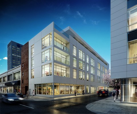 A modern building with large windows is shown in the image.