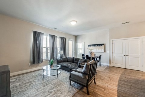 a living room with a couch and a table