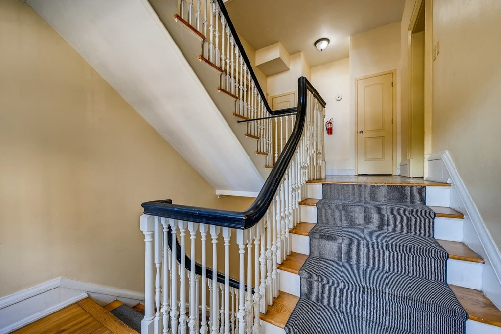 the stairway up to the second floor of a house