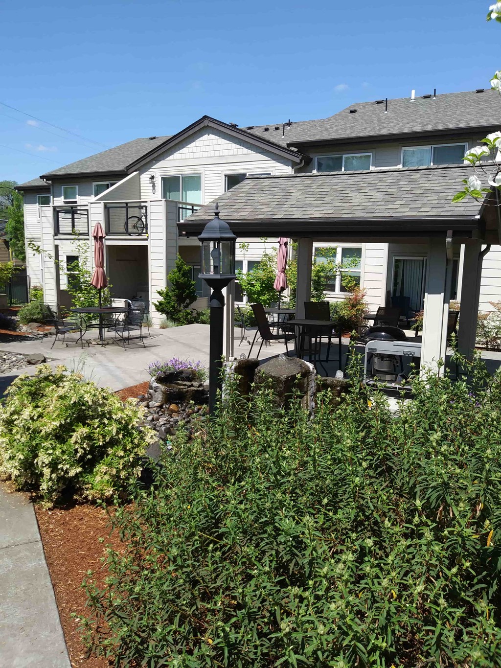 the front of our house with a patio