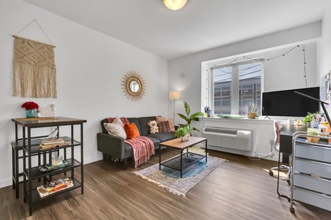 a living room with a couch and a table