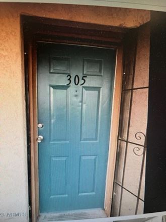 a blue door with the number 30 on it