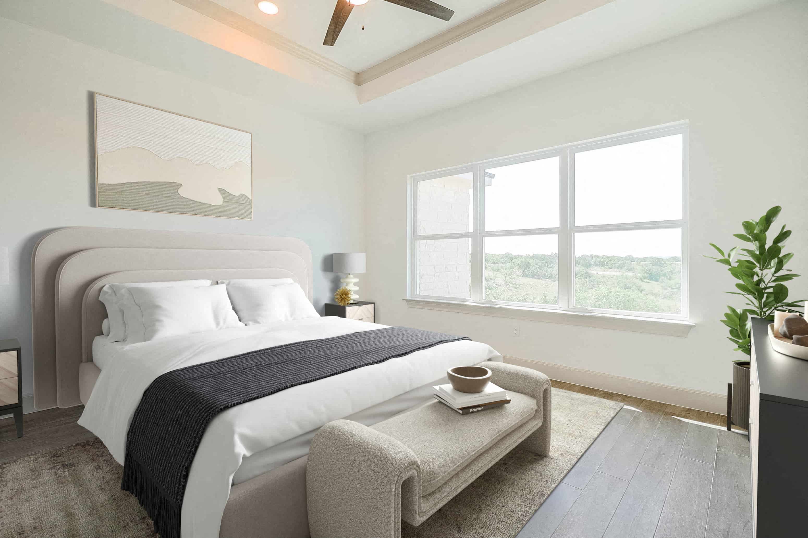 an image of a bedroom with a bed and a window