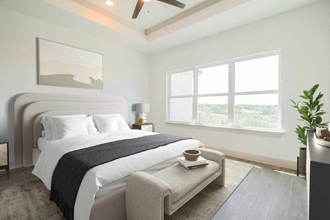 an image of a bedroom with a bed and a window