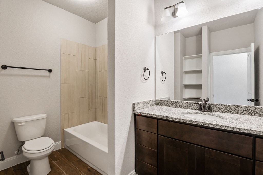 the preserve at ballantyne commons bathroom with toilet sink and tub