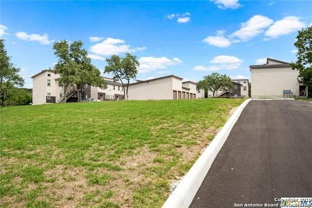 a row of houses on the side of a road