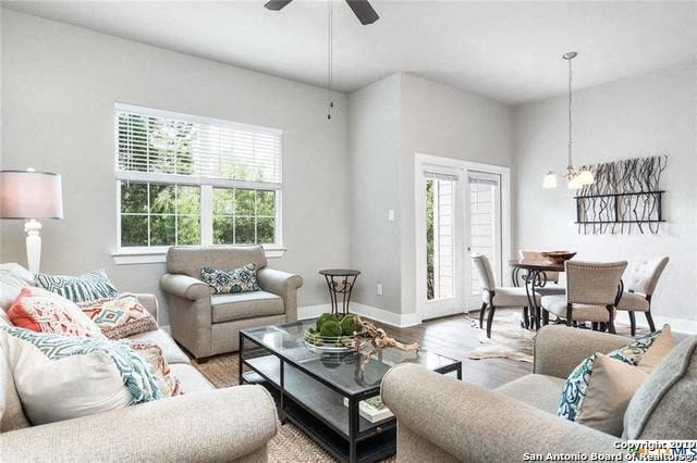 a living room with couches and chairs and a coffee table