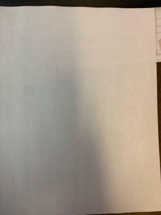 a piece of white paper on a table