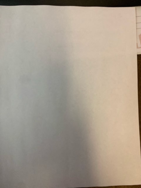 a piece of white paper on a table