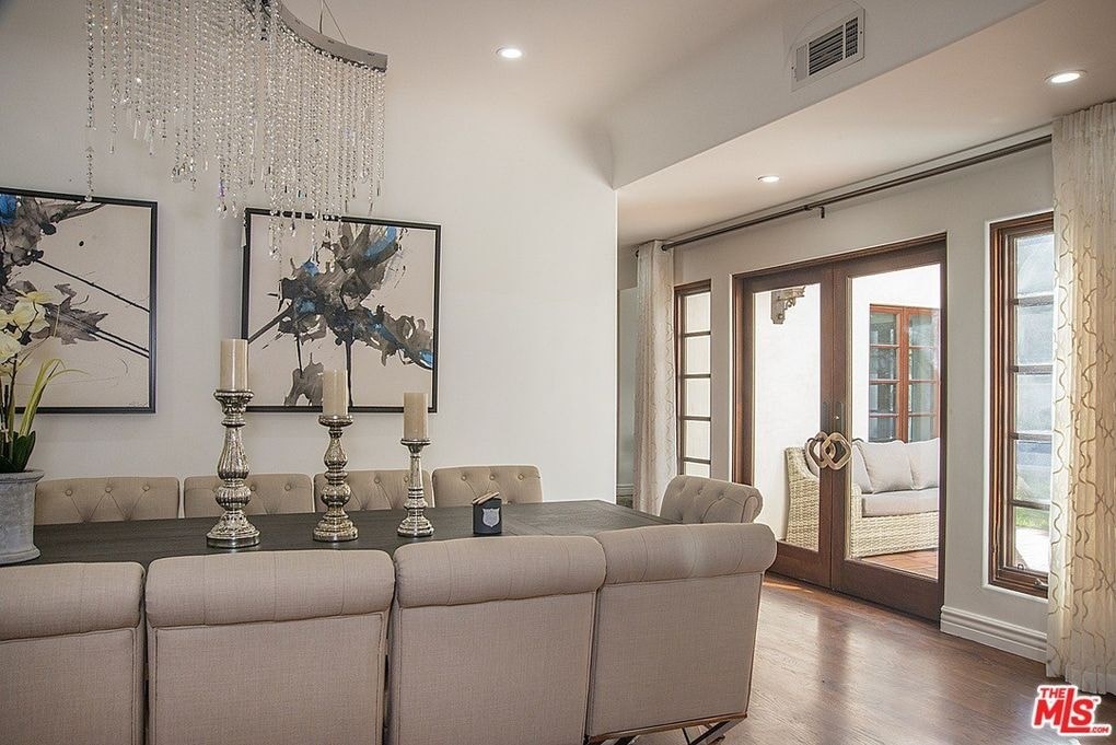 a living room with a couch and a table