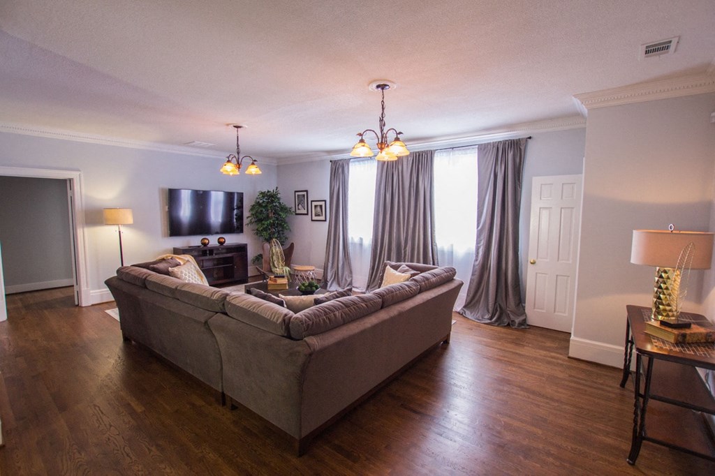 a living room with a couch and a tv