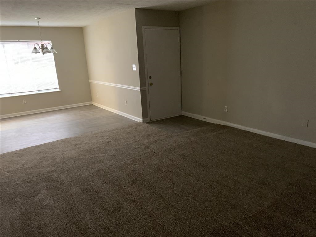 Empty Gorgeous Bedroom With Large Window Gorgeous Bedroom Designs at Hidden Woods, Georgia