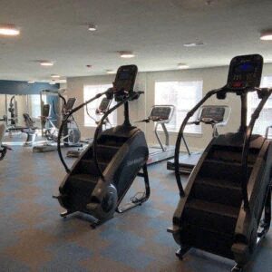 a gym with some exercise equipment in it