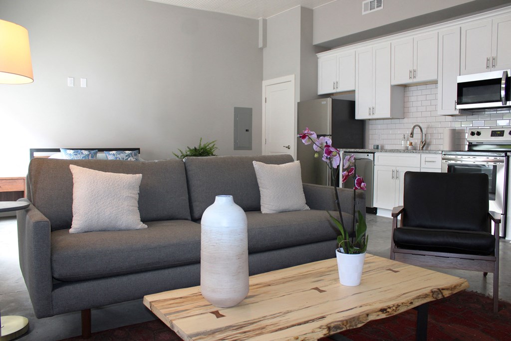 a living room with a couch and a coffee table