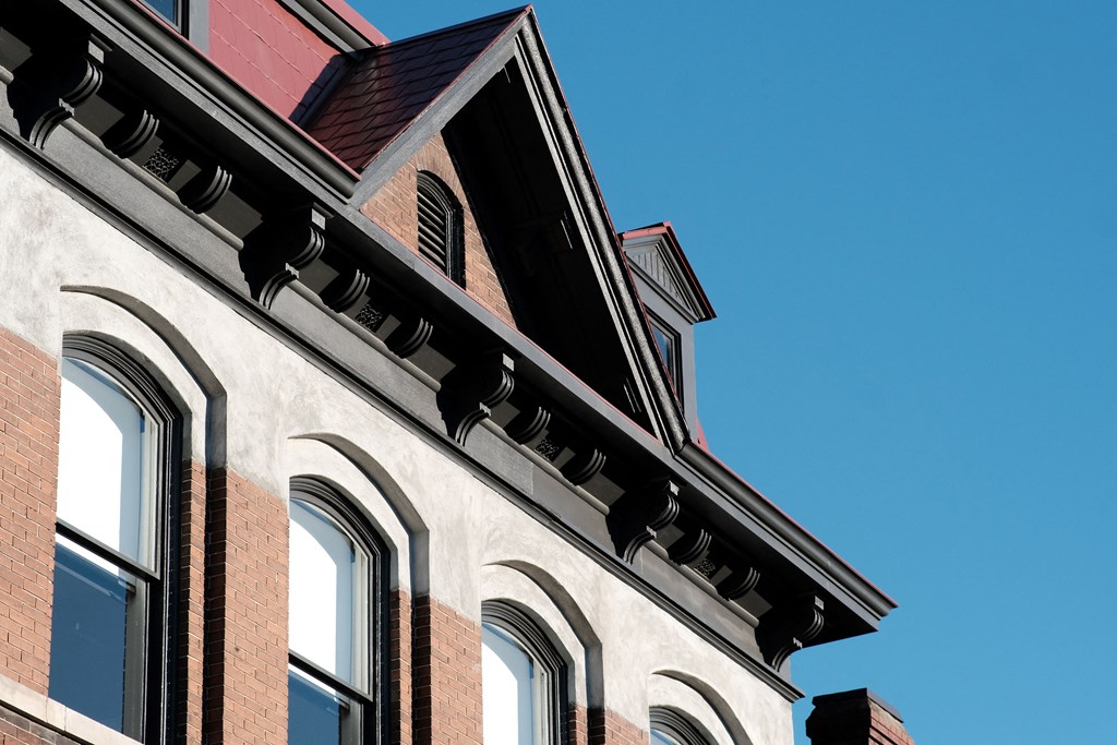 a building with a blue sky in the background