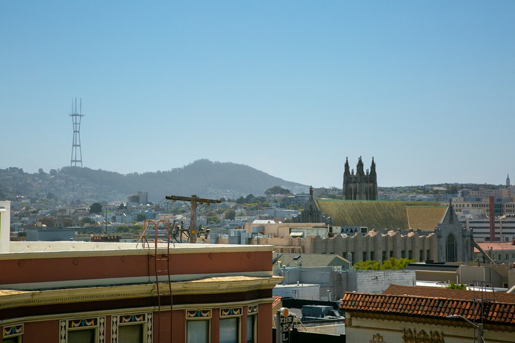 a view of the city from the roof of a building