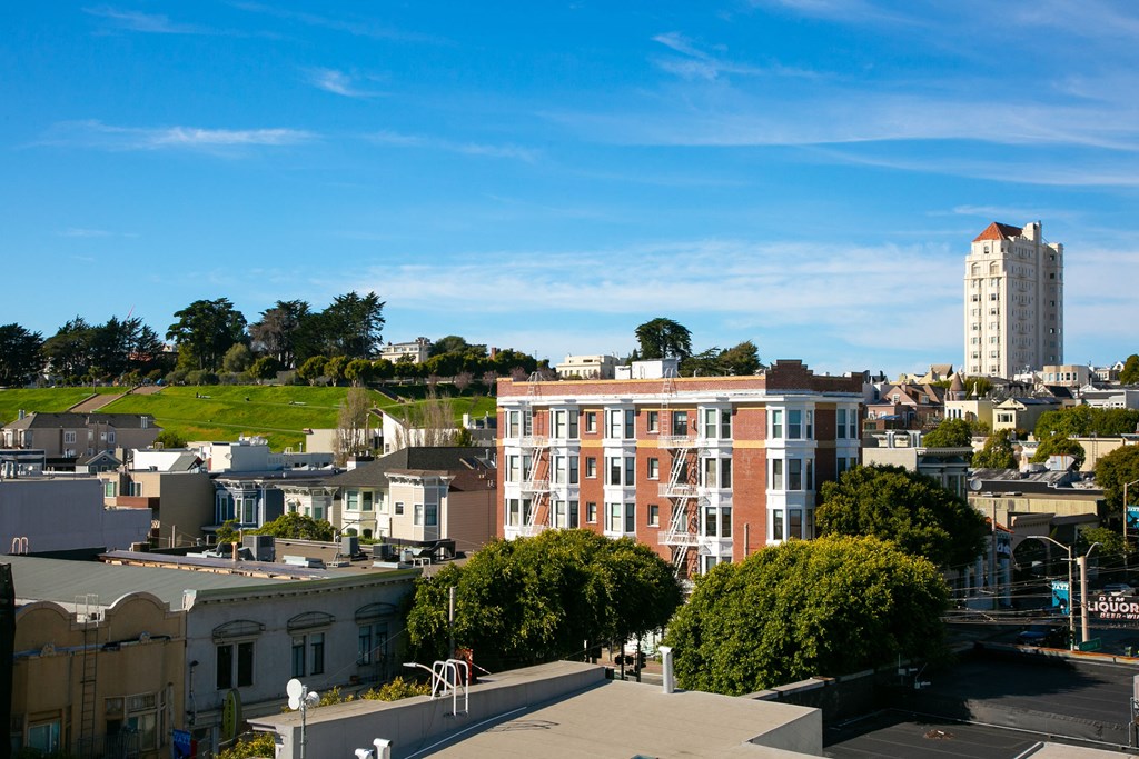 a view of the city from the roof of a building