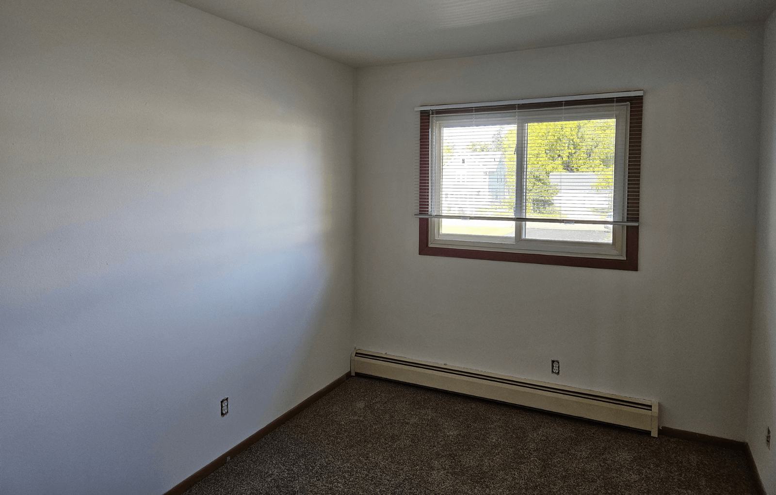 an empty room with a window