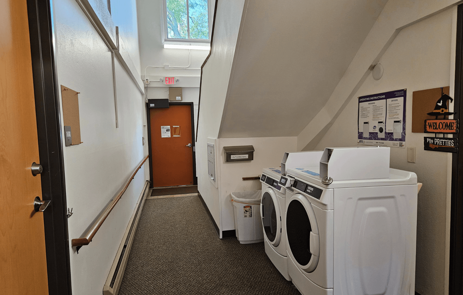 a laundry room with a washer and a dryer in it
