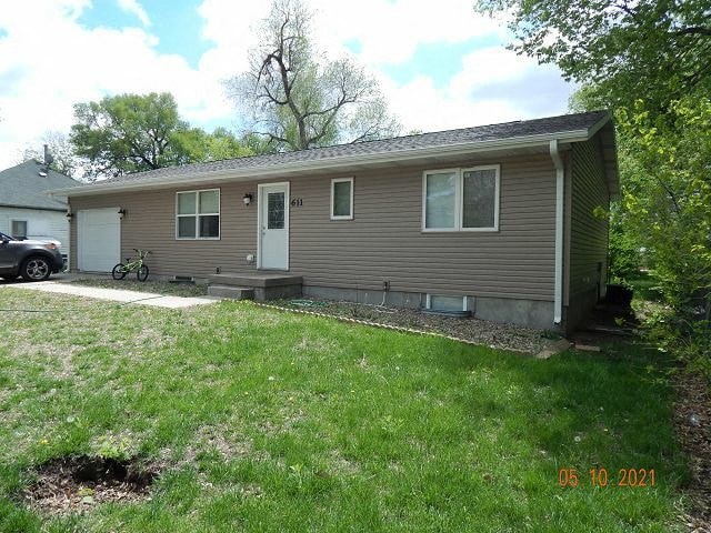 a house with a car parked in front of it